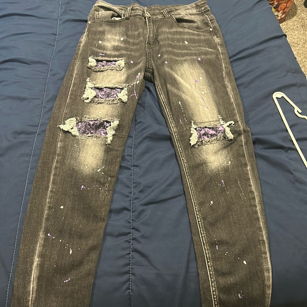 Black and purple splattered jeans